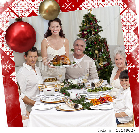 Family celebrating christmas dinner with turkey Family celebrating christmas dinner with turkey 12149627