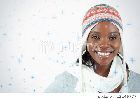 Smiling young woman with winter clothes on Smiling young woman with winter clothes on 12149777