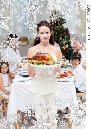 Mother showing turkey for christmas dinner 12149867