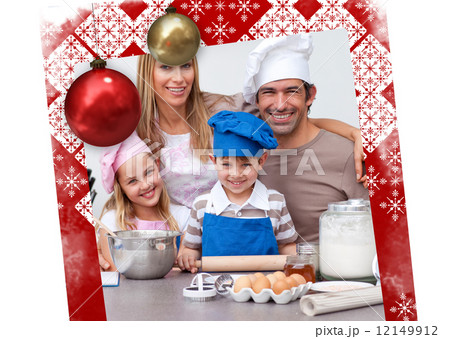 Smiling parents helping children baking in the kitchen 12149912