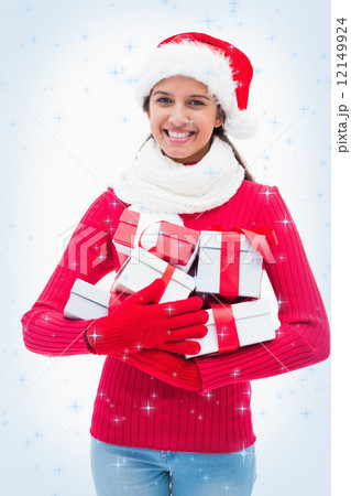 Beautiful festive woman holding gifts 12149924