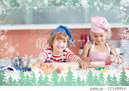 Nice children baking in a kitchen 12149954