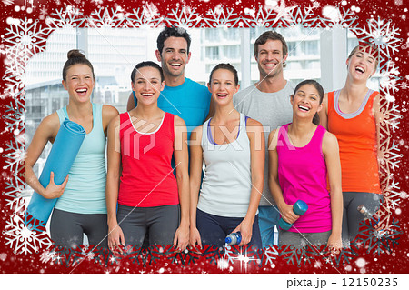 Portrait of fit people smiling in exercise room 12150235