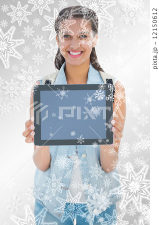 Pretty student showing her tablet pc Pretty student showing her tablet pc 12150612