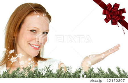 Composite image of confident businesswoman promoting 12150807