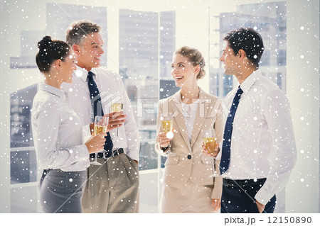 Group of cheerful business people clinking their flutes of champ 12150890