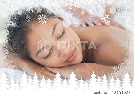 Beautiful brunette enjoying a massage 12151023