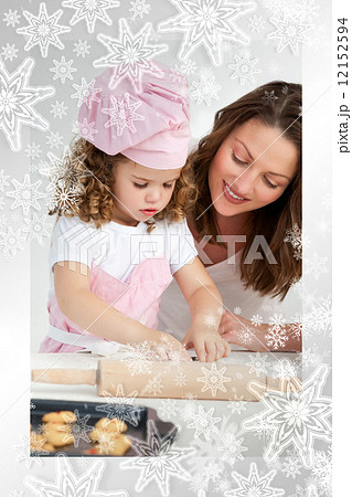 Little girl preparing a daught with her mother Little girl preparing a daught with her mother 12152594