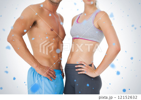 Mid section of a fit young couple 12152632