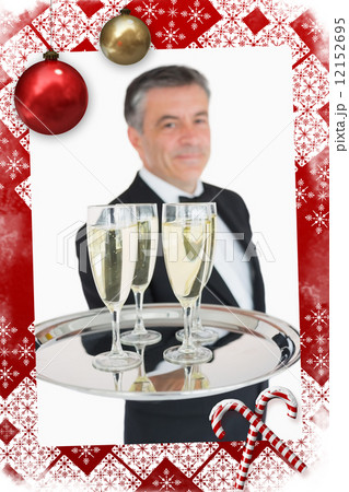 Composite image of waiter holding out tray with champagne Composite image of waiter holding out tray with champagne 12152695