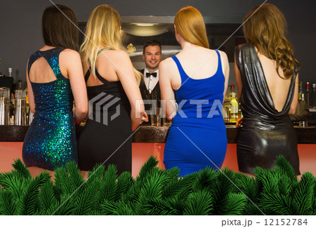 Composite image of attractive friends ordering drinks Composite image of attractive friends ordering drinks 12152784