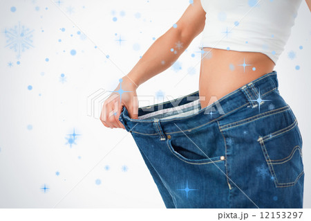 Woman wearing too large pants Woman wearing too large pants 12153297