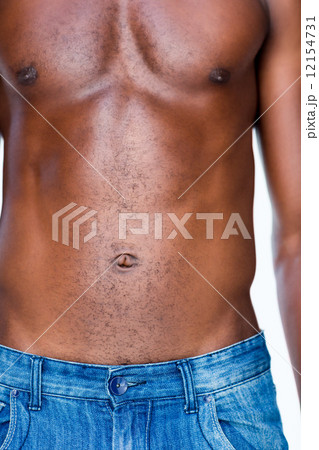 Mid section of a shirtless muscular man 12154731