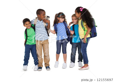 Cute schoolchildren smiling at camera and wearing backpacks 12155697