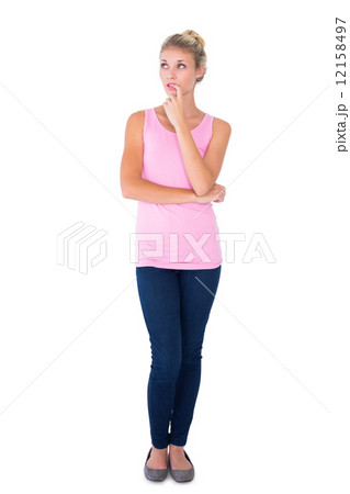 Pretty young blonde in pink thinking Pretty young blonde in pink thinking 12158497
