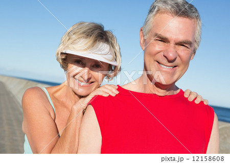 Active senior couple stretching before a jog 12158608