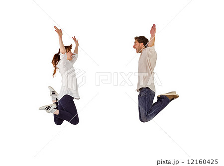 Couple jumping in the air 12160425