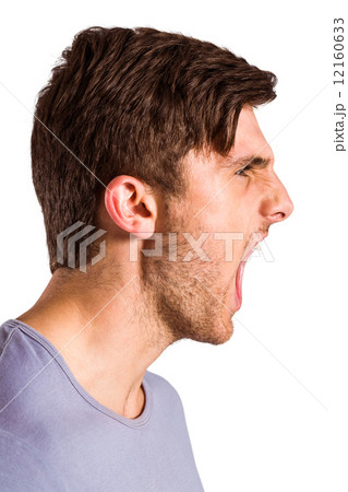 Angry young man with stubble shouting Angry young man with stubble shouting 12160633