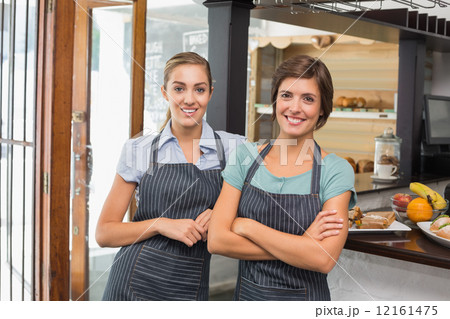 Pretty waitresses smiling at camera 12161475