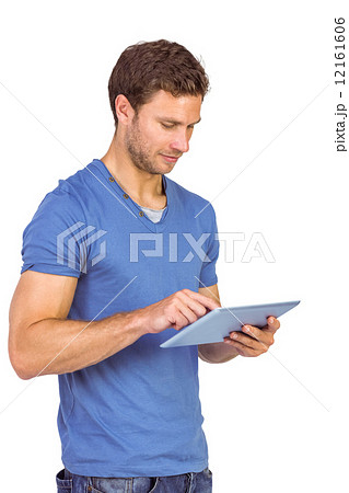 Man scrolling through tablet pc Man scrolling through tablet pc 12161606