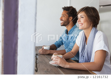 Casual friends having coffee together Casual friends having coffee together 12161732
