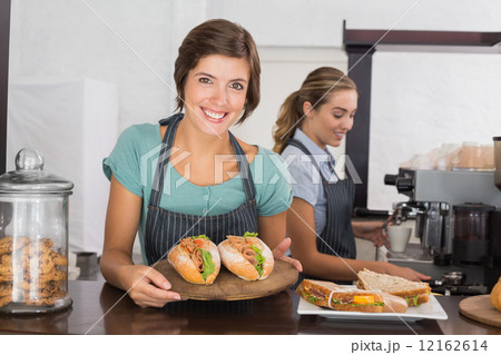 Pretty waitresses working with a smile 12162614