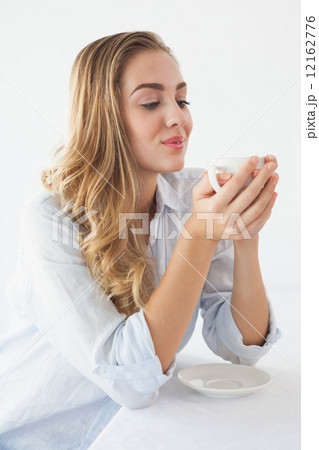Pretty blonde having a coffee 12162776