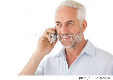 Smiling mature man using mobile phone Smiling mature man using mobile phone 12162810