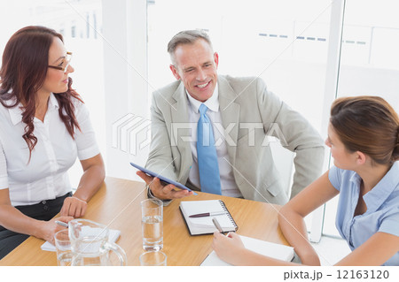 Business team in a meeting Business team in a meeting 12163120