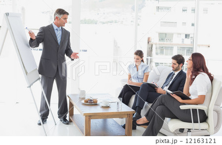 Businessman giving a presentation 12163121