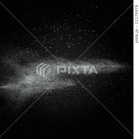 White powder exploding isolated on black White powder exploding isolated on black 12176976
