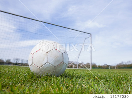 Football on an empty pitch in front of goal Football on an empty pitch in front of goal 12177080