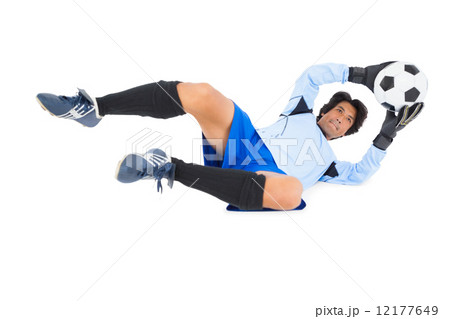 Goalkeeper in blue making a save 12177649