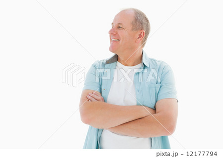 Happy older man with arms crossed 12177794