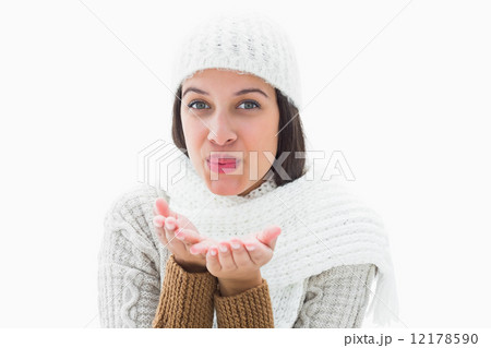 Pretty brunette blowing kiss to camera Pretty brunette blowing kiss to camera 12178590