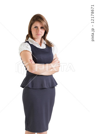 Portrait of a beautiful young businesswoman with arms crossed 12178671