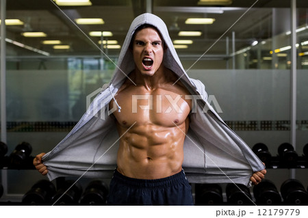Muscular man shouting in health club Muscular man shouting in health club 12179779