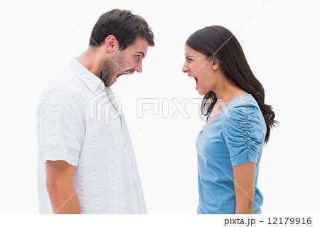 Angry couple shouting at each other 12179916