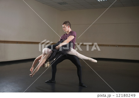 Ballet partners dancing gracefully together Ballet partners dancing gracefully together 12180249
