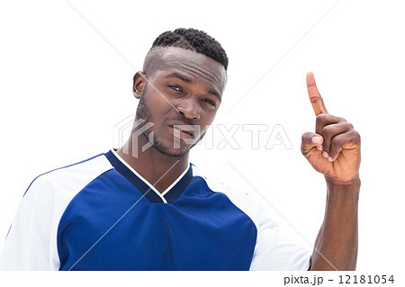 Football player in blue pointing up 12181054