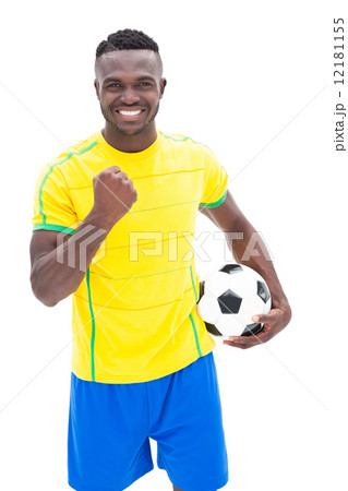 Football player in yellow celebrating a win Football player in yellow celebrating a win 12181155