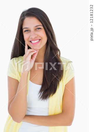 Happy casual woman thinking with hand on chin Happy casual woman thinking with hand on chin 12181232