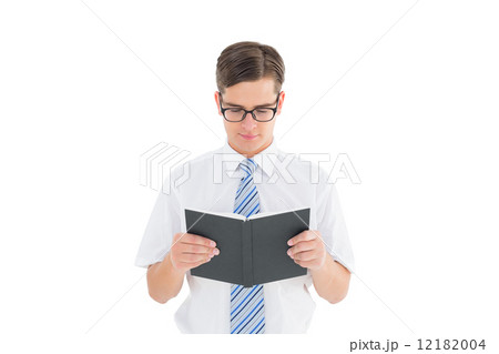 Geeky businessman reading from book 12182004