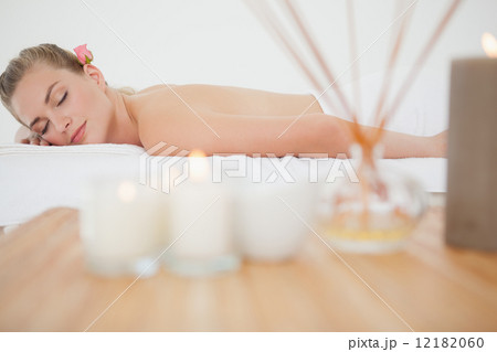 Beautiful blonde relaxing on massage table 12182060
