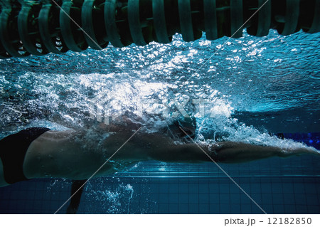 Fit swimmer training on his own 12182850