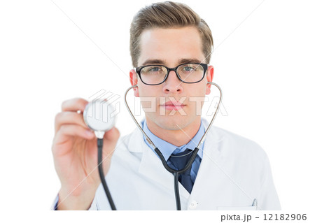 Handsome doctor listening with stethoscope Handsome doctor listening with stethoscope 12182906