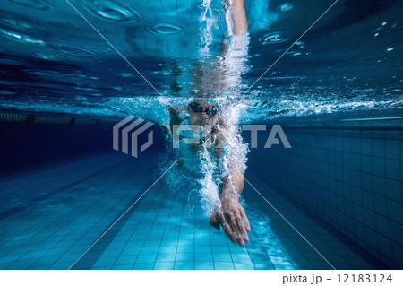 Fit swimmer training by himself 12183124
