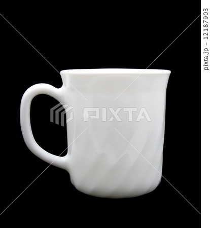 white cup isolated on a black background 12187903