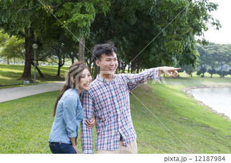 Young couple in a park. 12187984