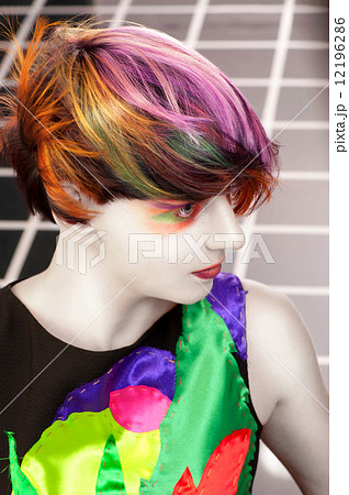 Portrait of a beautiful girl with dyed hair, professional hair c 12196286
